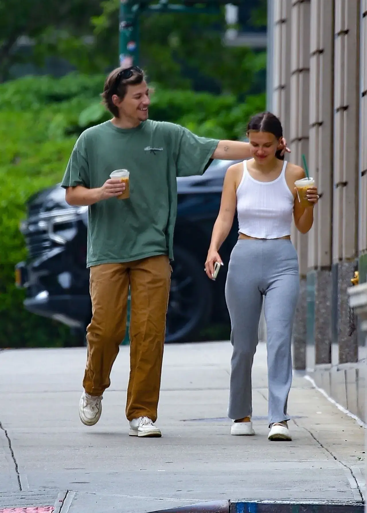 Millie Bobby Brown Stills in White Top Blue jeans in New York